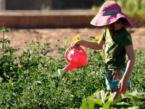 Kid with watering can