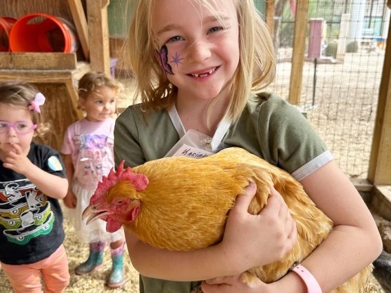 Youth with chicken