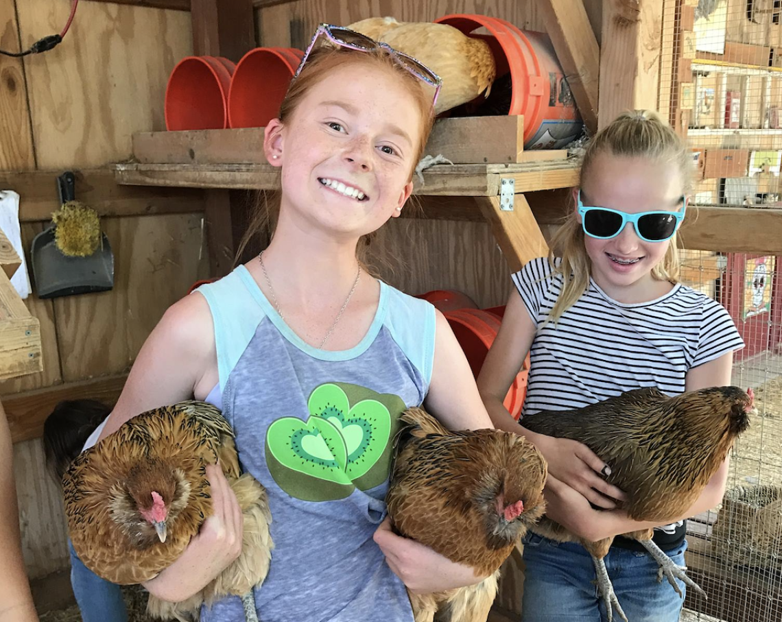 Girls with chickens
